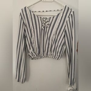 White and navy blue stripped cropped long sleeve top with ruffles